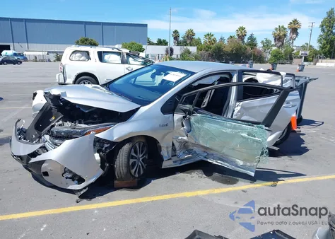 2021 Toyota Prius Prime Limited из США, поврежденный, VIN JTDKAMFP8M3195089